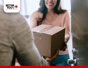 Woman receive delivery order from online pharmacy