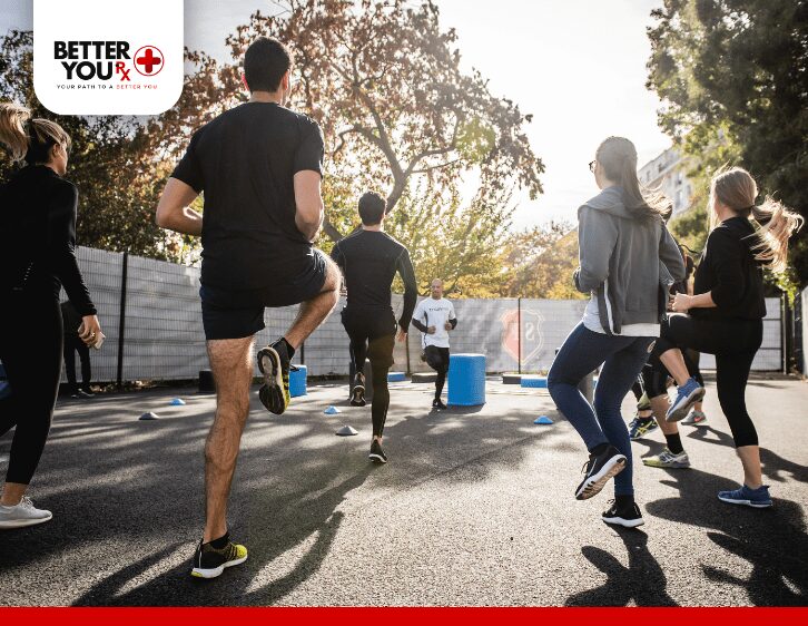 Group of people doing exercise outdoor in the morning