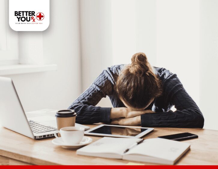 woman sleeping on her desk cause by lack of sleep