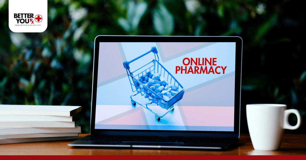online pharmacy image in a laptop next to a cup