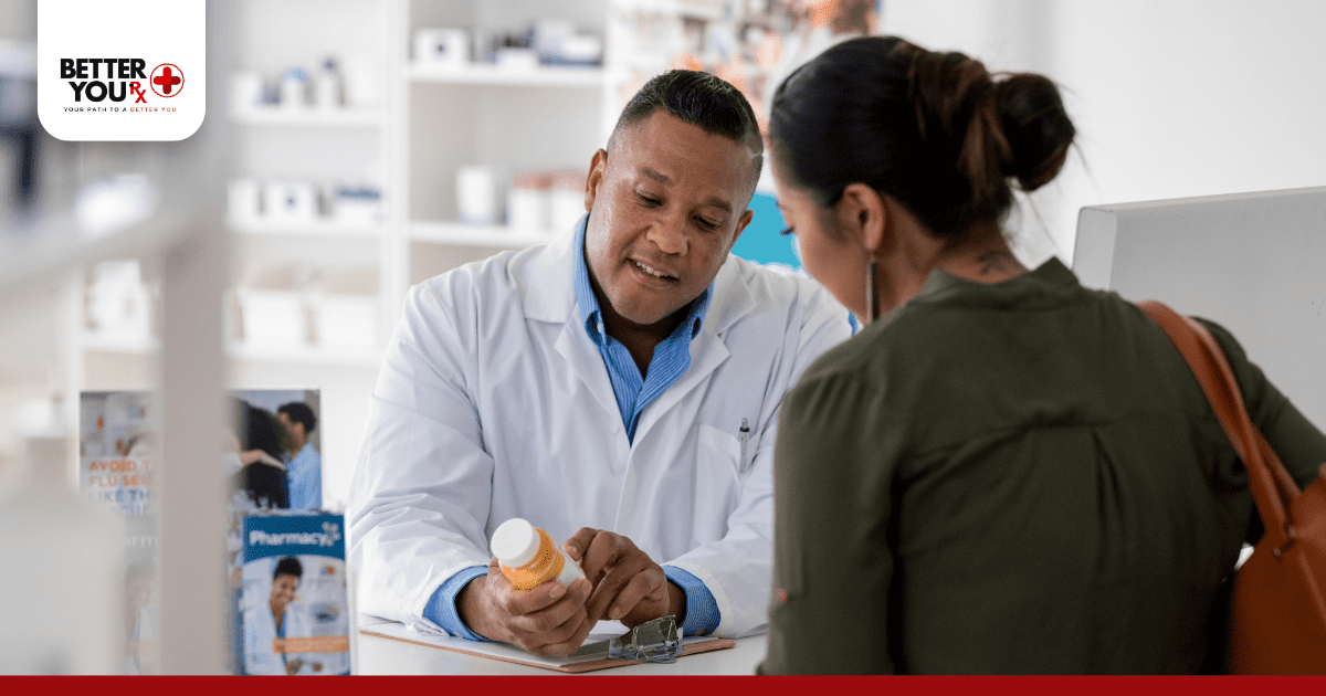 doctor showing a patient a bottle of medicine