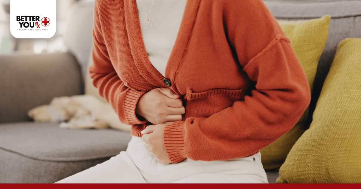 woman having stomachache - wegovy vs ozempic side effects